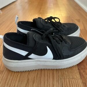 Nike Women’s Black and White Court Vision sneakers